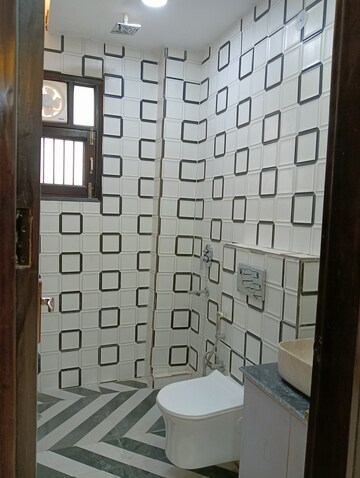Bathroom in 3 BHK Builder Floor at Mahavir Enclave 1 – for Rent