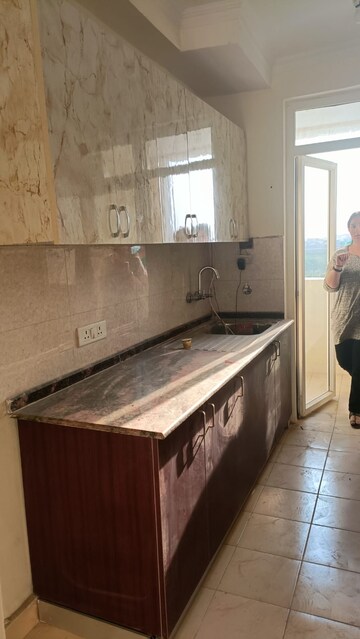 Kitchen in 3 BHK Apartment at Aims Golf Avenue I, Sector 75 – for Rent