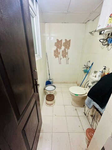 Bathroom in 2 BHK Apartment at Amrapali Empire, Sain Vihar – for Sale