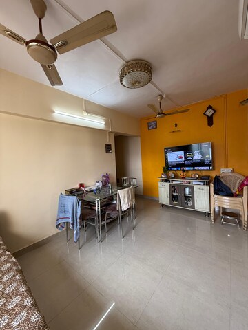 Living Room in 1 BHK Apartment at Shree Chitrakut CHS, Dahisar East – for Sale