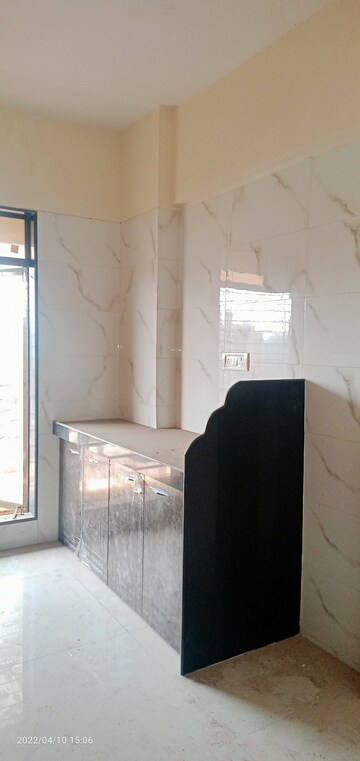 Kitchen in 2 BHK Apartment at Mahadev Tower, Mira Road – for Rent