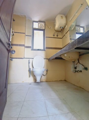 Bathroom in 2 BHK Apartment at Unitech Uniworld Gardens 2, Sector 47 – for Rent