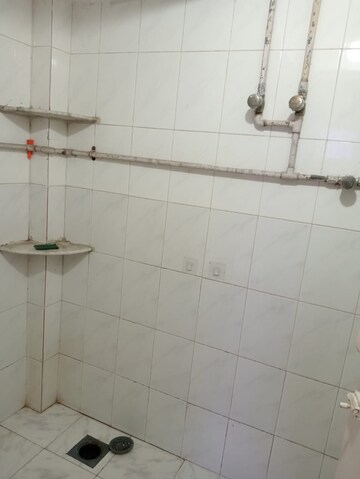 Bathroom in 1 BHK Apartment at Sunrise CHS Mhada, Goregaon East – for Rent