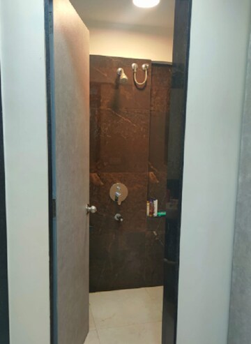Bathroom in 1 BHK Apartment at MICL Aaradhya Highpark, Mira Road – for Rent