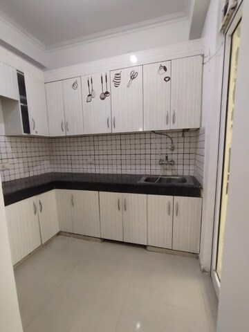 Kitchen in 2 BHK Apartment at Gaur City 7th Avenue, Sector 4, Greater Noida – for Sale