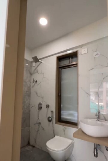 Bathroom in 2 BHK Apartment at JK Iris, Mira Road – for Rent