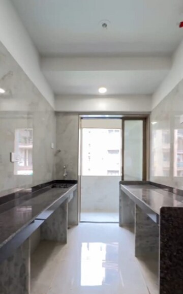 Kitchen in 2 BHK Apartment at JK Iris, Mira Road – for Rent