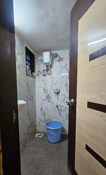 Bathroom in 1.5 BHK Apartment at RNA NG Canary, Mira Road – for Rent