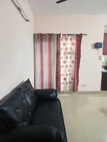 Living Room in 2 BHK Apartment at Aims Golf City, Sector 75 – for Rent