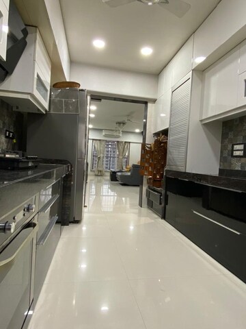 Kitchen in 3 BHK Apartment at Mota Mahal Apartment, Andheri West – for Rent
