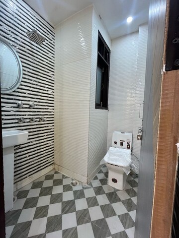 Bathroom in 2 BHK Builder Floor at Dwarka Mor – for Sale