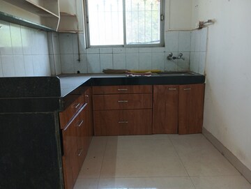 Kitchen in 2 BHK Apartment at Happy Valley, Manpada – for Sale