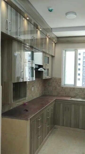 Kitchen in 3 BHK Apartment at Amrapali Golf Homes, Sector 4, Greater Noida – for Rent