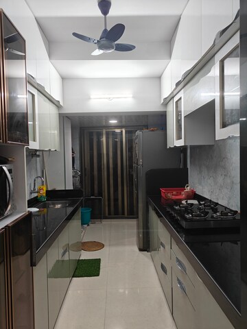 Kitchen in 2 BHK Apartment at Blue Mountain Towers, Shashtri Nagar – for Sale