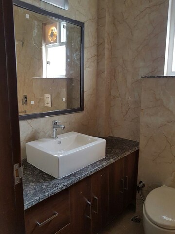 Bathroom in 3 BHK Builder Floor at Kalkaji – for Rent