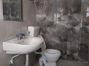 Bathroom in 2 BHK Apartment at Shapoorji Pallonji Joyville Phase 2, Sector 102 – for Rent