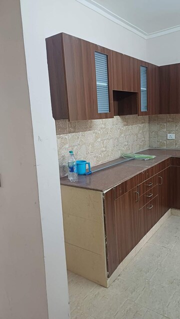 Kitchen in 2 BHK Apartment at Amrapali Golf Homes, Sector 4, Greater Noida – for Rent