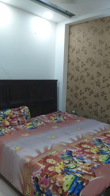 Bedroom in 2 BHK Builder Floor at Mahavir Enclave 1 – for Rent