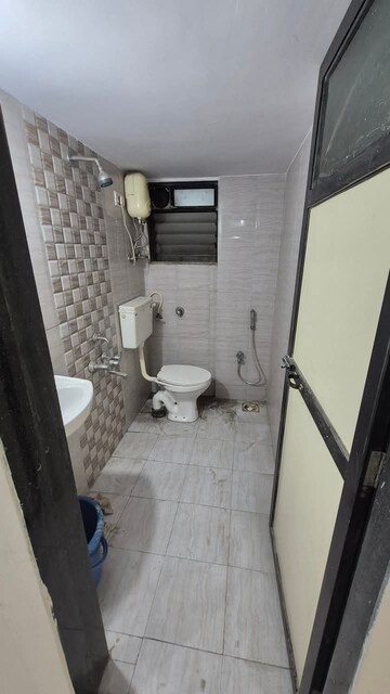 Bathroom in 2 BHK Apartment at HDIL Residency Park, Virar West – for Sale