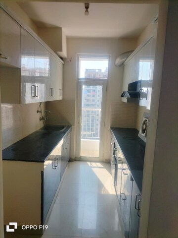 Kitchen in 3 BHK Apartment at Proview Officer City 2, Raj Nagar Extension – for Rent