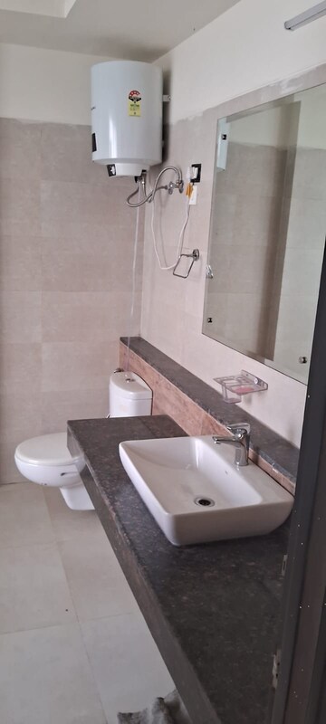 Bathroom in 4 BHK Apartment at Emaar Gurgaon Greens, Sector 102 – for Rent