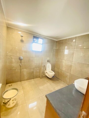 Bathroom in 4 BHK Builder Floor at Palam Vihar Residents Association, Palam Vihar – for Rent