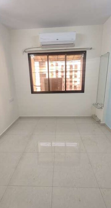 Room in 2 BHK Apartment at Kanchan Pushp Society, Ghodbunder Road – for Rent