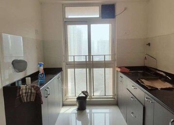 Kitchen in 1 BHK Apartment at Vijay Orovia, Ghodbunder Road – for Rent