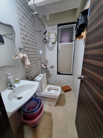 Bathroom in 1 BHK Apartment at Ajmera New Era, Kalyan West – for Rent