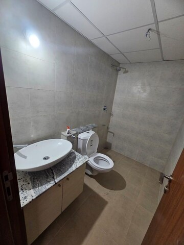 Bathroom in 3 BHK Apartment at Bhartiya Nikoo Homes, Thanisandra Main Road – for Rent