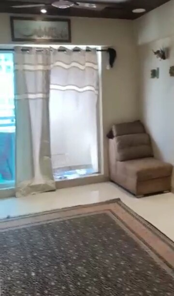 Living Room in 1 BHK Apartment at Atlanta Enclave, Shilphata – for Rent