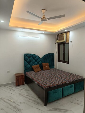 Bedroom in 3 BHK Builder Floor at Freedom Fighters Enclave – for Rent