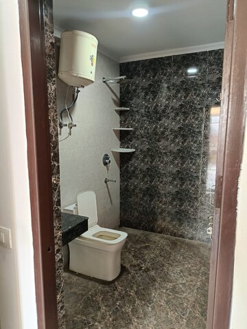 Bathroom in 3 BHK Builder Floor at Freedom Fighters Enclave – for Rent