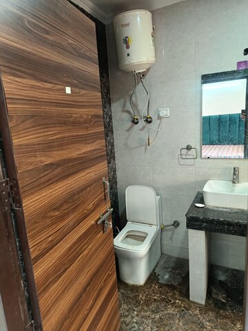 Bathroom in 3 BHK Builder Floor at Freedom Fighters Enclave – for Rent