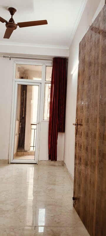 Building Lobby in 2 BHK Apartment at Amrapali Golf Homes, Sector 4, Greater Noida – for Sale