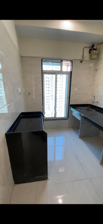 Team Area in 1 BHK Apartment at Hirani Om Sukhkarta Heights, Vikhroli East – for Rent