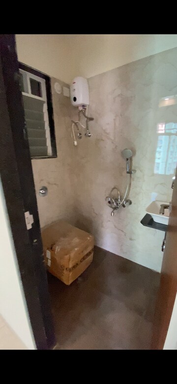 Bathroom in 1 BHK Apartment at Hirani Om Sukhkarta Heights, Vikhroli East – for Rent