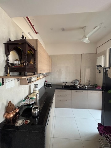 Kitchen in 2 BHK Apartment at Godrej Golf Meadows, Poyanje – for Rent