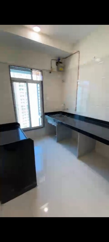 Team Area in 2 BHK Apartment at Hirani Om Sukhkarta Heights, Vikhroli East – for Rent