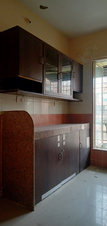 Kitchen in 2 BHK Apartment at Aakash Nidhi, Mira Road – for Rent