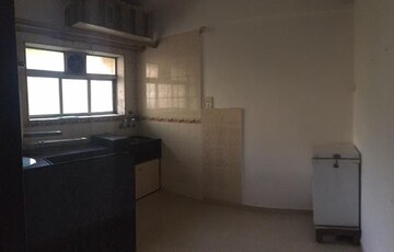 Kitchen in 1 BHK Apartment at Satya Darshan CHS, Andheri East – for Rent