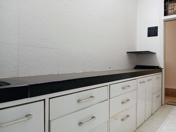 Kitchen in 2 BHK Apartment at Sat Kartar, Dadar West – for Rent