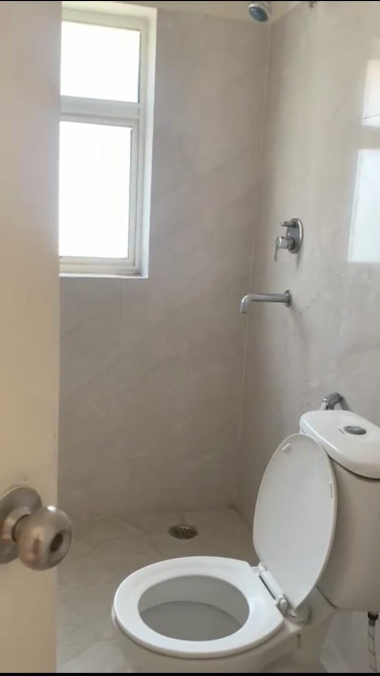 Bathroom, lavender-floors 3 Bedroom 1080 Sq.Ft. Apartment In Sector 89 Faridabad 8218262