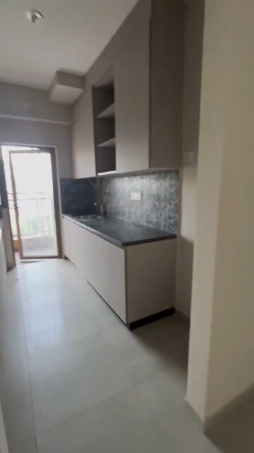 Kitchen in 2 BHK Apartment at Triveni Pearl, Khadakpada – for Sale