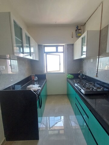 Kitchen in 1 BHK Apartment at Sheth Irene, Malad West – for Rent