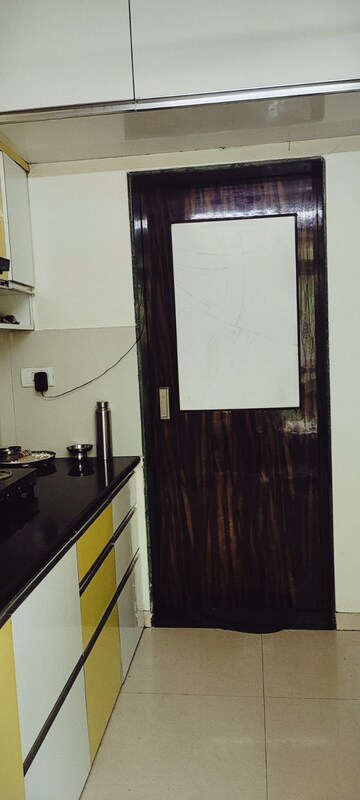 Kitchen in 1 BHK Apartment at Hiranandani Estate Penrith, Ghodbunder Road – for Rent