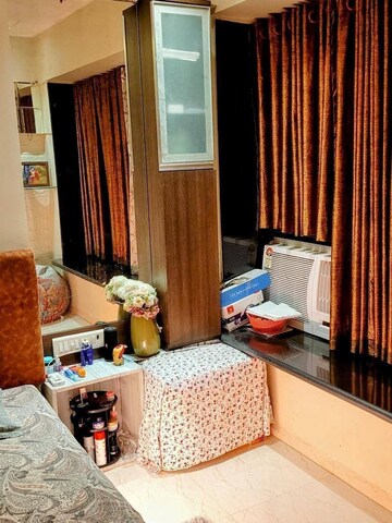 Living Room in 2 BHK Apartment at Durvas CHS, Nalasopara East – for Sale