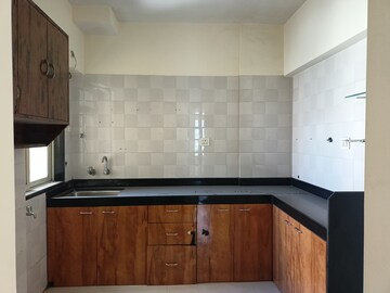 Kitchen in 2 BHK Apartment at Rosa Royale, Ghodbunder Road – for Rent