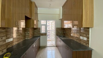 Kitchen in 3 BHK Apartment at Amrapali Centurian Park, Tech Zone 4 Greater Noida – for Rent