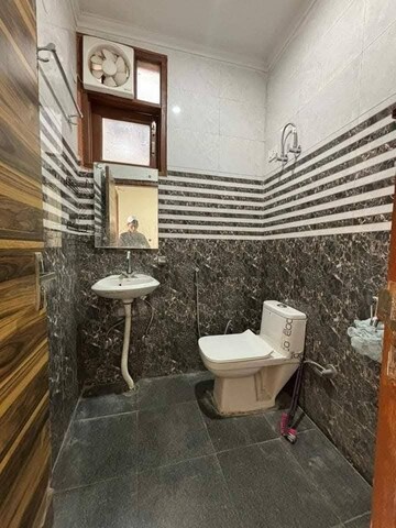 Bathroom in 2 BHK Builder Floor at Freedom Fighters Enclave – for Rent
